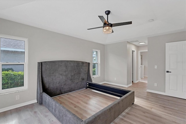 unfurnished room featuring wood-type flooring and ceiling fan