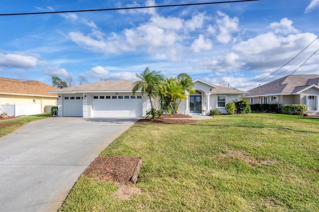 single story home with a garage and a front yard