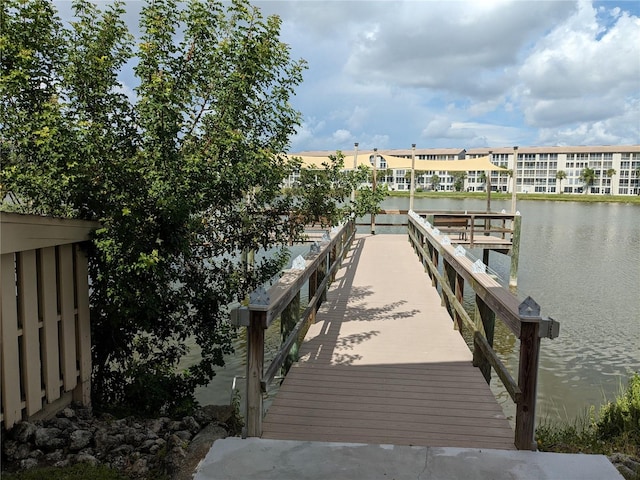 dock area featuring a water view