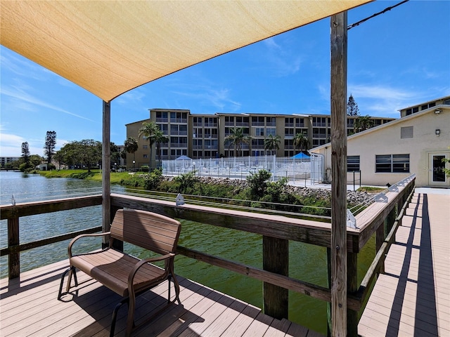 dock area with a water view