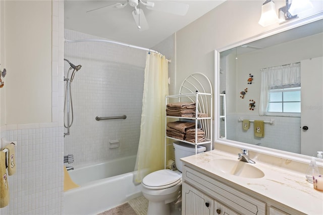 full bathroom with toilet, shower / bath combo, a ceiling fan, and vanity