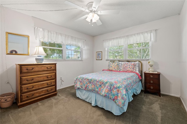 bedroom featuring carpet floors, ceiling fan, and baseboards