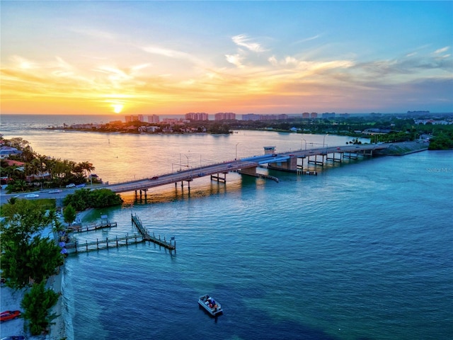 dock area with a view of city and a water view