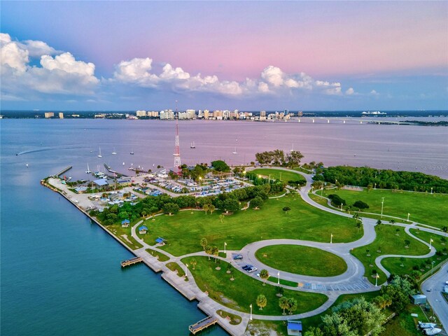 aerial view at dusk with a water view