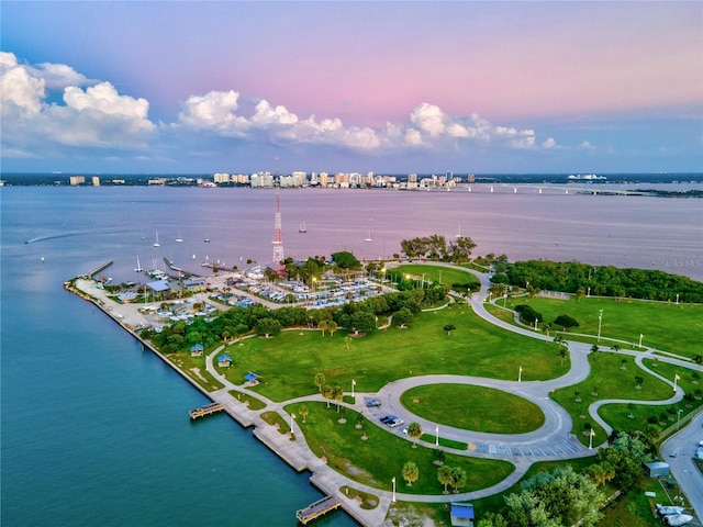 birds eye view of property featuring a water view