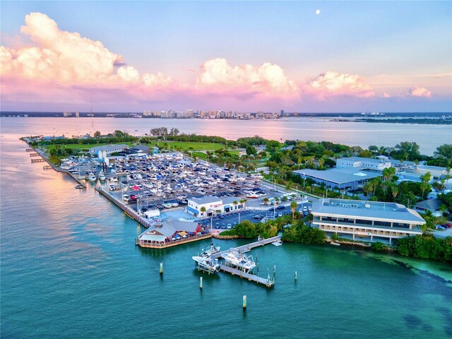 aerial view at dusk with a water view