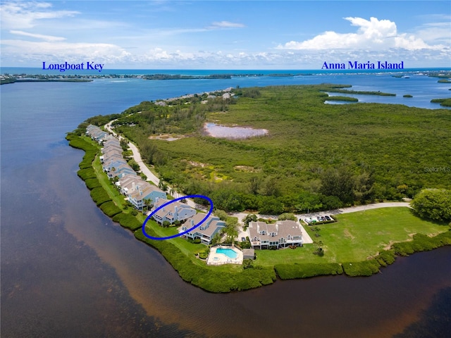 birds eye view of property featuring a water view