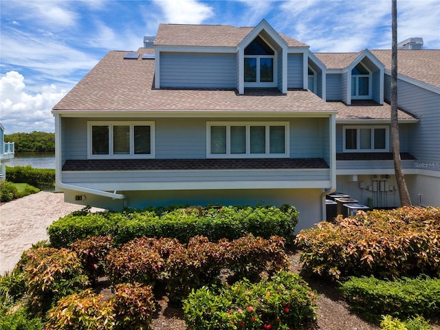 view of front of property featuring cooling unit