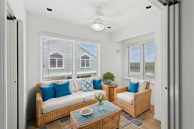 interior space featuring ceiling fan