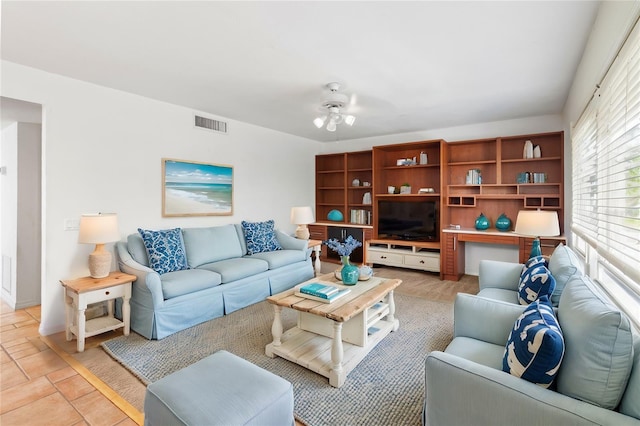 living room featuring ceiling fan