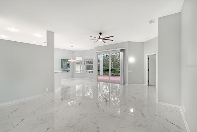 unfurnished living room with marble finish floor, visible vents, baseboards, and ceiling fan with notable chandelier