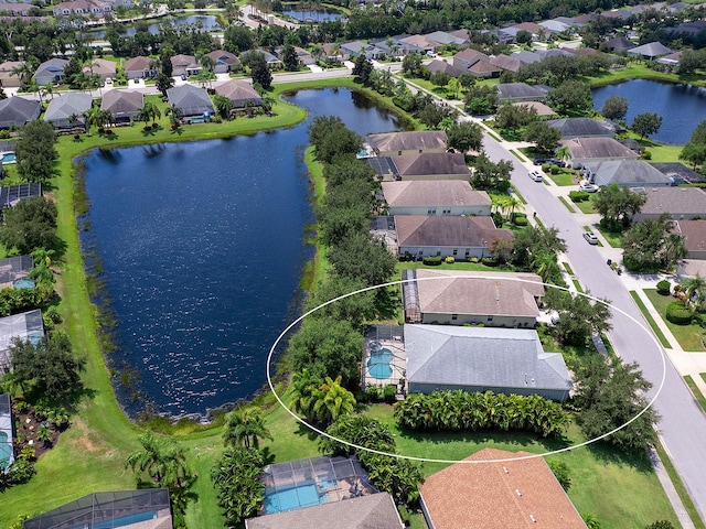 bird's eye view with a water view