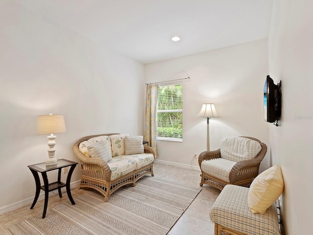 sitting room featuring light tile patterned floors