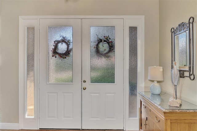 foyer featuring french doors