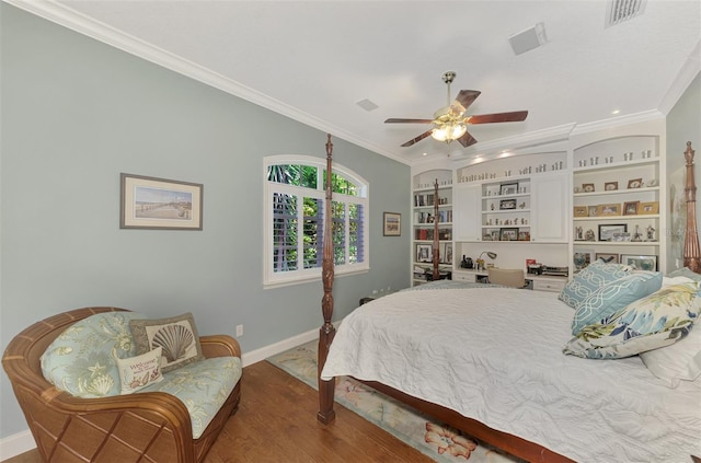 bedroom with ceiling fan, ornamental molding, and hardwood / wood-style flooring