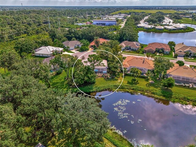 drone / aerial view with a water view