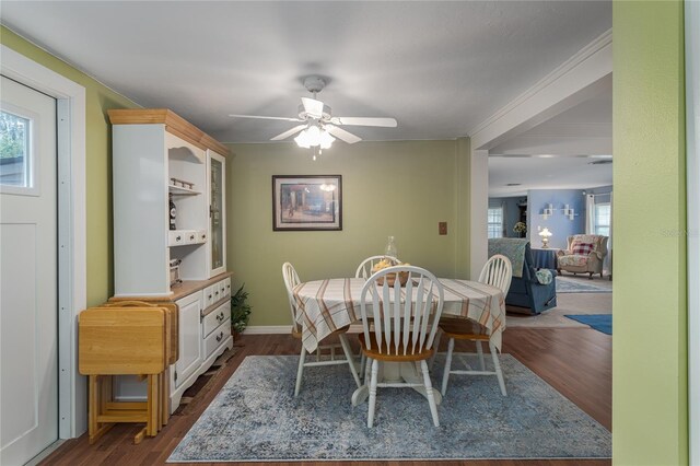 dining room featuring ceiling fan and hardwood / wood-style flooring