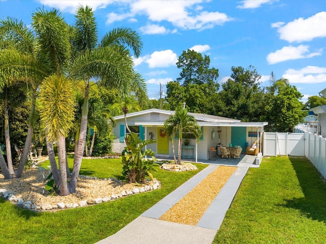 view of front of house with a front lawn