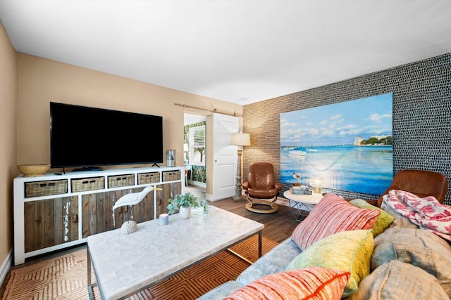 living room with wood-type flooring and a water view