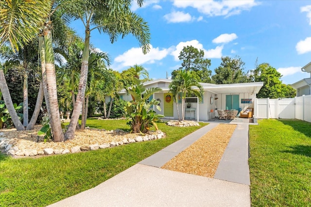 view of front of home featuring a front yard