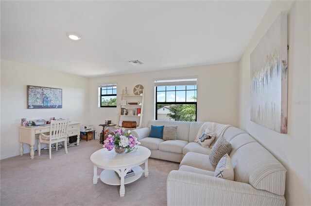 living room with light carpet