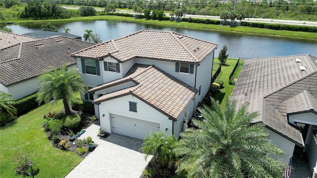 bird's eye view with a water view