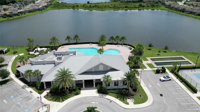 drone / aerial view with a water view