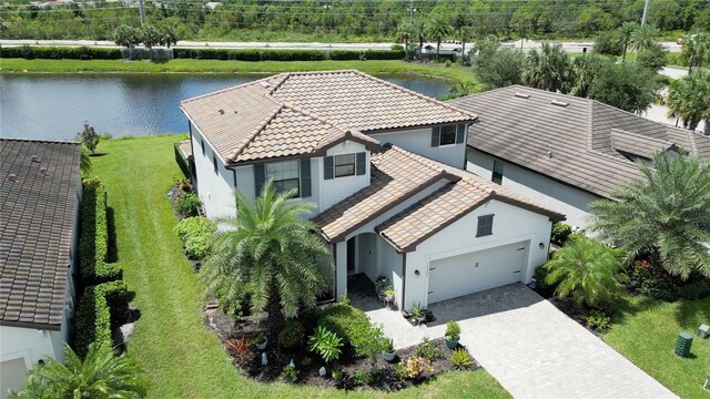 bird's eye view with a water view