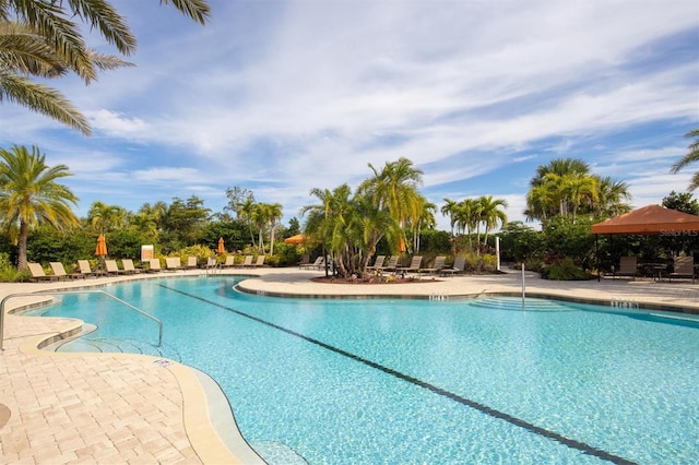 view of swimming pool featuring a gazebo and a patio