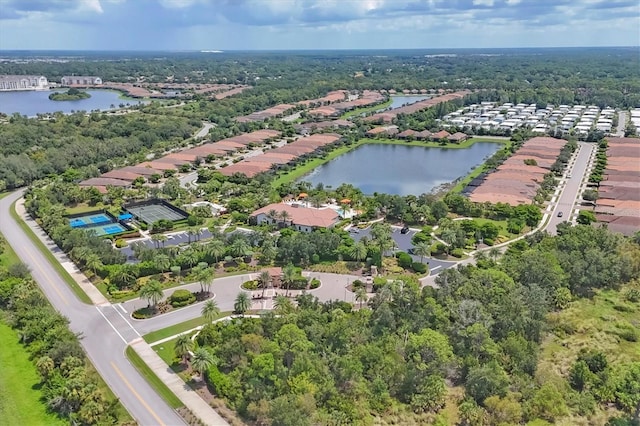 drone / aerial view with a water view