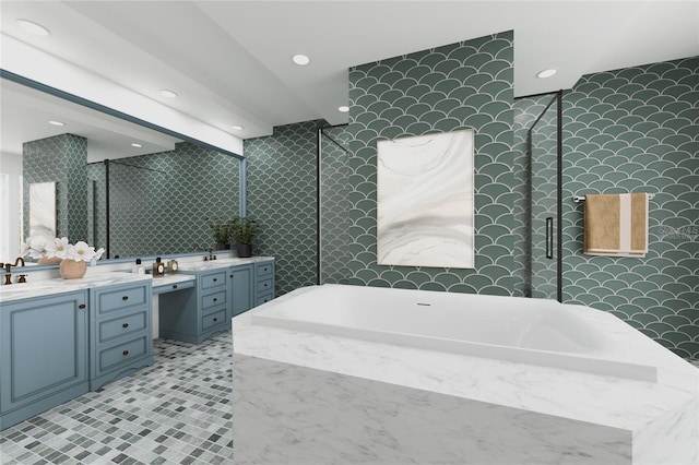 bathroom featuring shower with separate bathtub, tile patterned flooring, and vanity