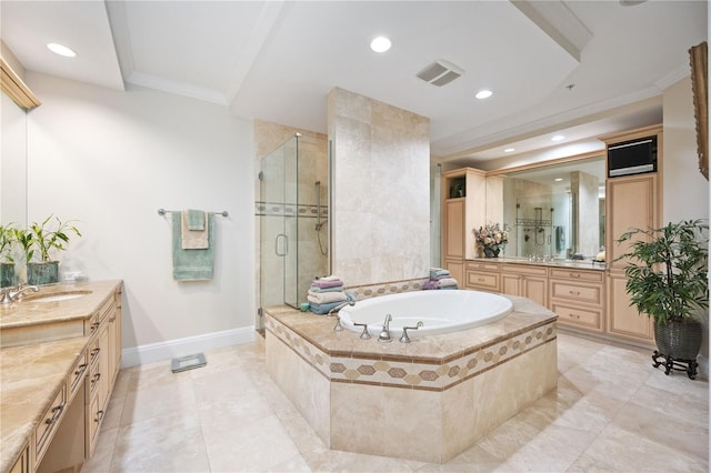 bathroom with crown molding, visible vents, a stall shower, a sink, and baseboards