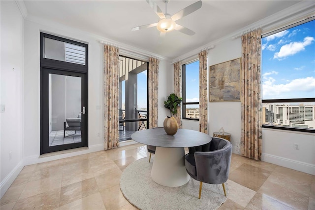 50 Central Ave Unit 17Phb, Sarasota, FL 34236 - dining room featuring crown molding, a ceiling fan, and light tile patterned floors