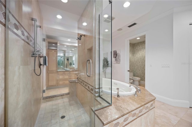 50 Central Ave Unit 17Phb, Sarasota, FL 34236 - full bathroom with a stall shower, a garden tub, tile patterned floors, vanity, and recessed lighting