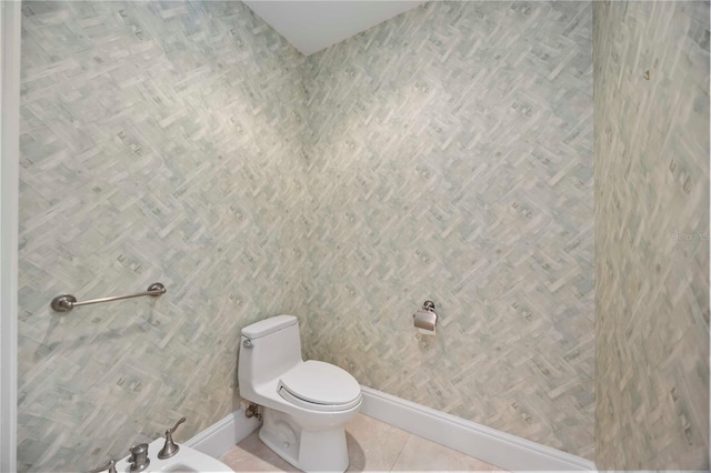 50 Central Ave Unit 17Phb, Sarasota, FL 34236 - half bathroom featuring a bidet and tile patterned flooring