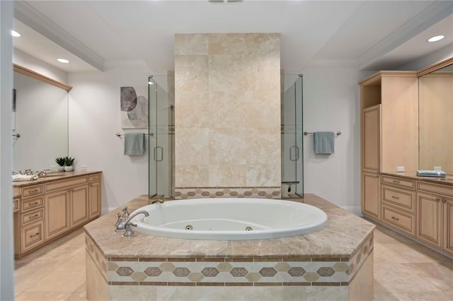 50 Central Ave Unit 17Phb, Sarasota, FL 34236 - bathroom featuring a tub with jets, vanity, a stall shower, recessed lighting, and crown molding