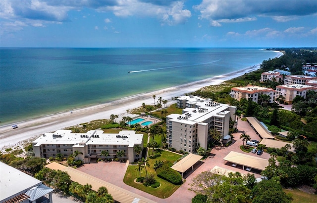 aerial view featuring a water view and a view of the beach