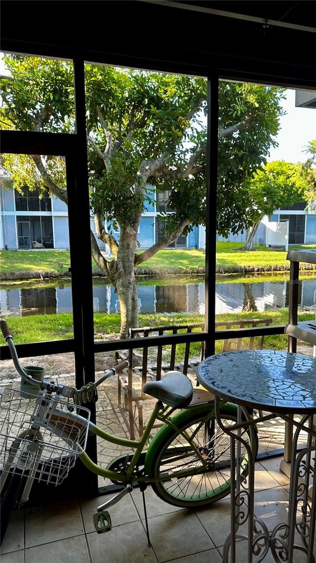 balcony featuring a water view