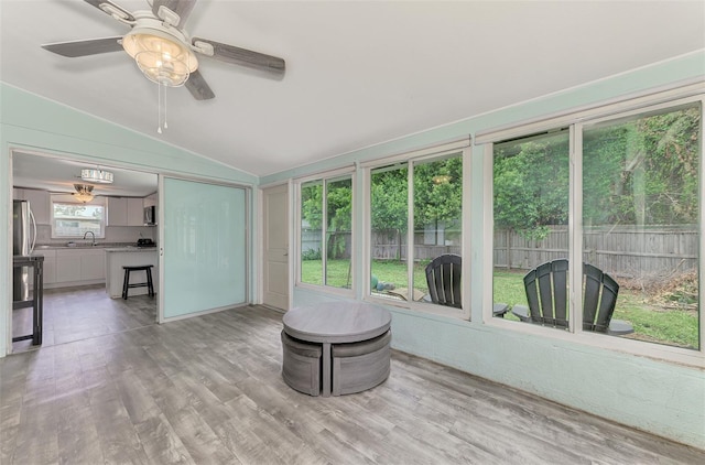 2900 Siesta Dr, Venice, FL 34293 - unfurnished sunroom with a ceiling fan, vaulted ceiling, and a sink
