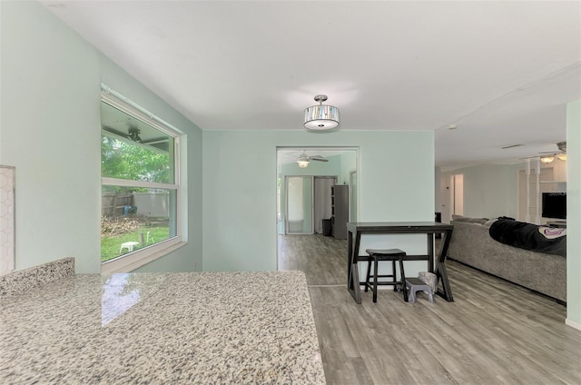 2900 Siesta Dr, Venice, FL 34293 - dining room featuring a ceiling fan and wood finished floors