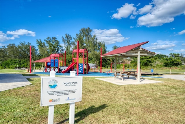2900 Siesta Dr, Venice, FL 34293 - community playground featuring a lawn