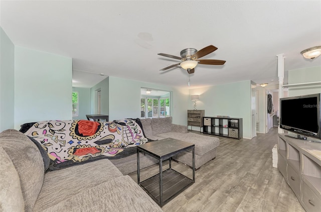 2900 Siesta Dr, Venice, FL 34293 - living area with light wood-type flooring and a ceiling fan