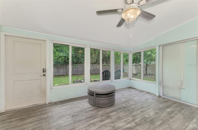 2900 Siesta Dr, Venice, FL 34293 - unfurnished sunroom featuring vaulted ceiling and ceiling fan