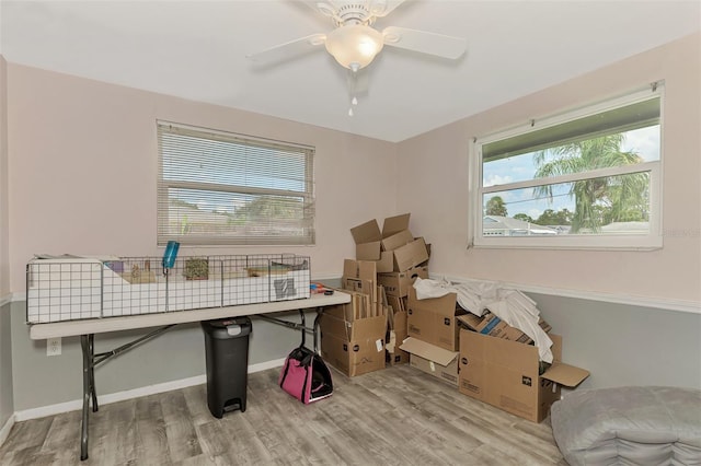 2900 Siesta Dr, Venice, FL 34293 - interior space with ceiling fan, baseboards, and wood finished floors