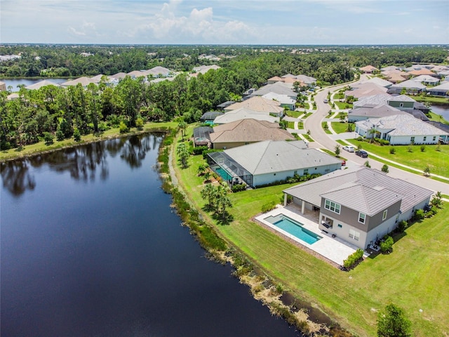 birds eye view of property featuring a residential view and a water view