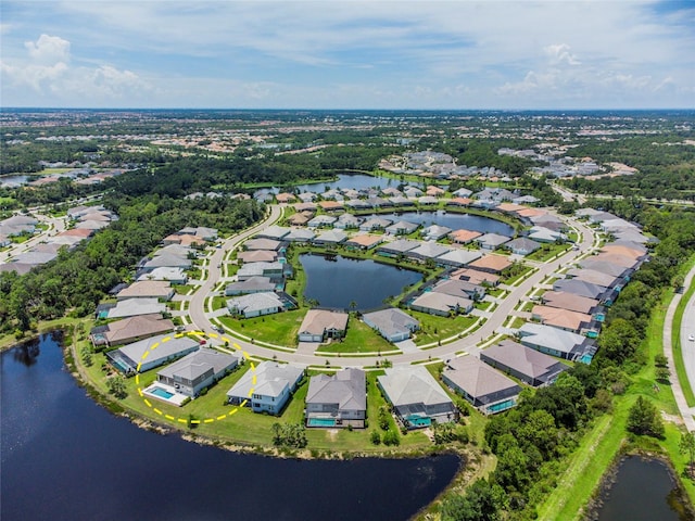 aerial view featuring a residential view and a water view