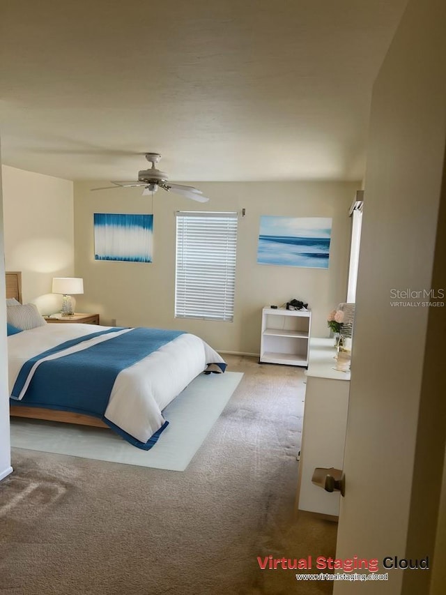 bedroom featuring carpet flooring and ceiling fan