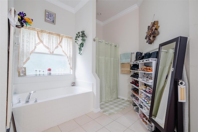 bathroom with tile patterned flooring, a bathtub, and crown molding