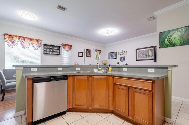 kitchen featuring sink, crown molding, light tile patterned flooring, and stainless steel dishwasher