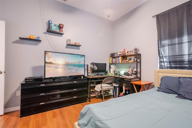 bedroom with light wood-type flooring